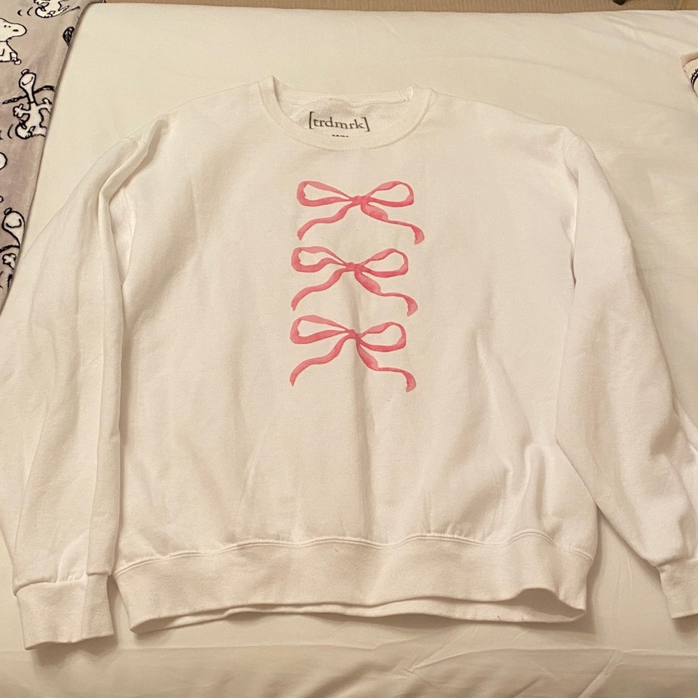 White Sweater with Pink Bow Design